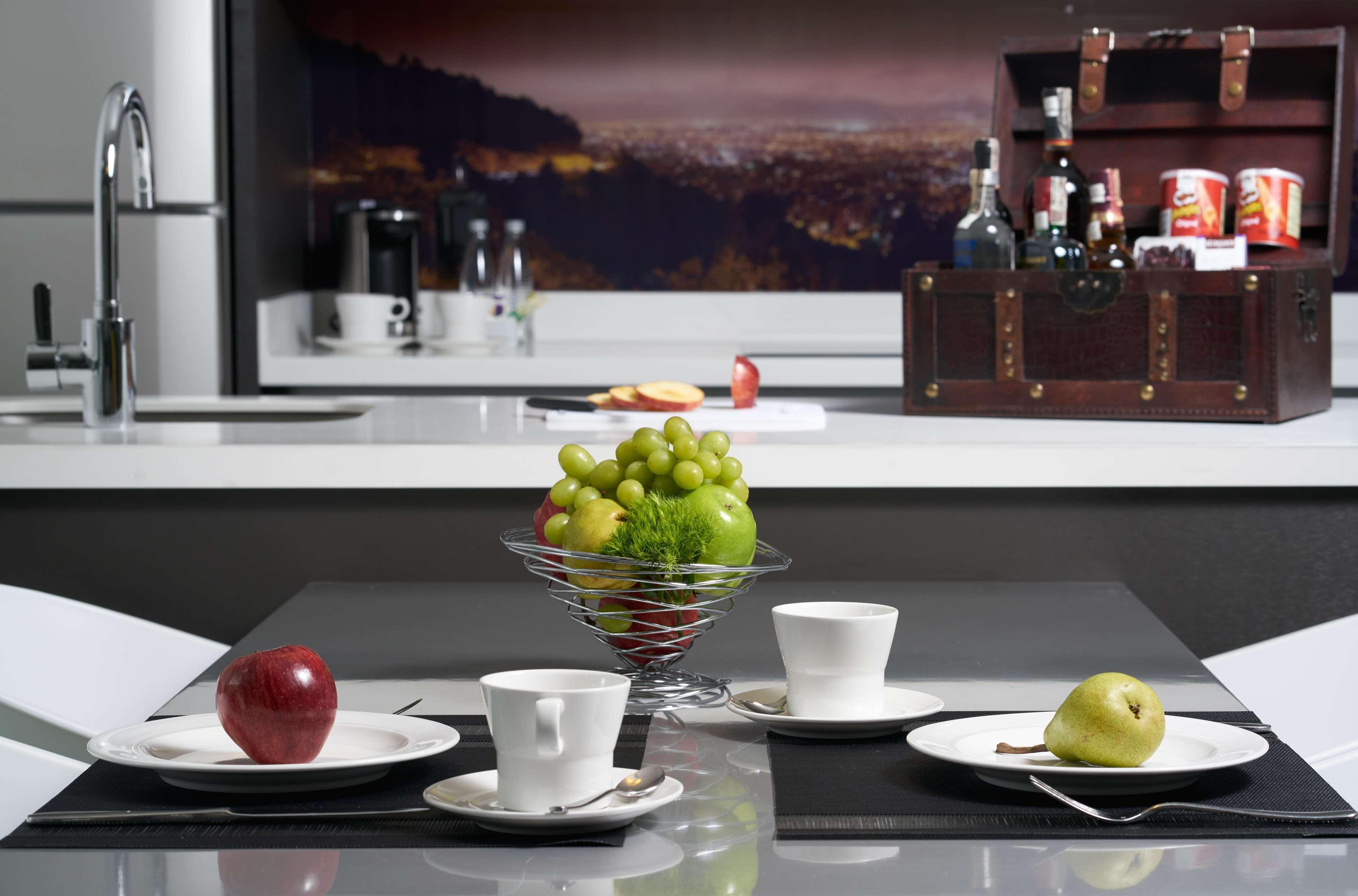 Hotel 100 Luxury Suites By Preferred Bogotá Esterno foto A kitchen with a built-in coffee machine