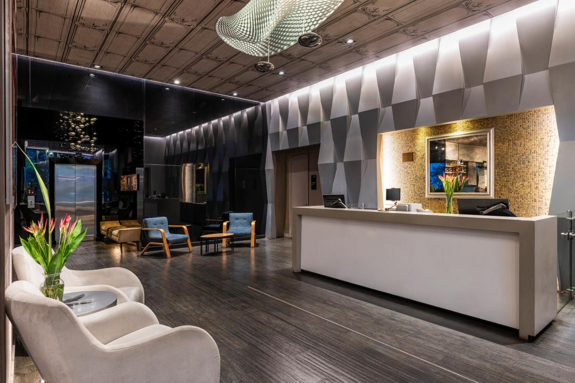 Hotel 100 Luxury Suites By Preferred Bogotá Esterno foto The lobby of the hotel