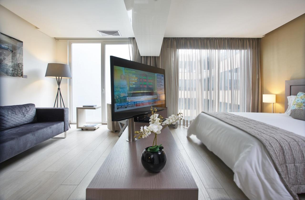 Hotel 100 Luxury Suites By Preferred Bogotá Esterno foto A room at the hotel